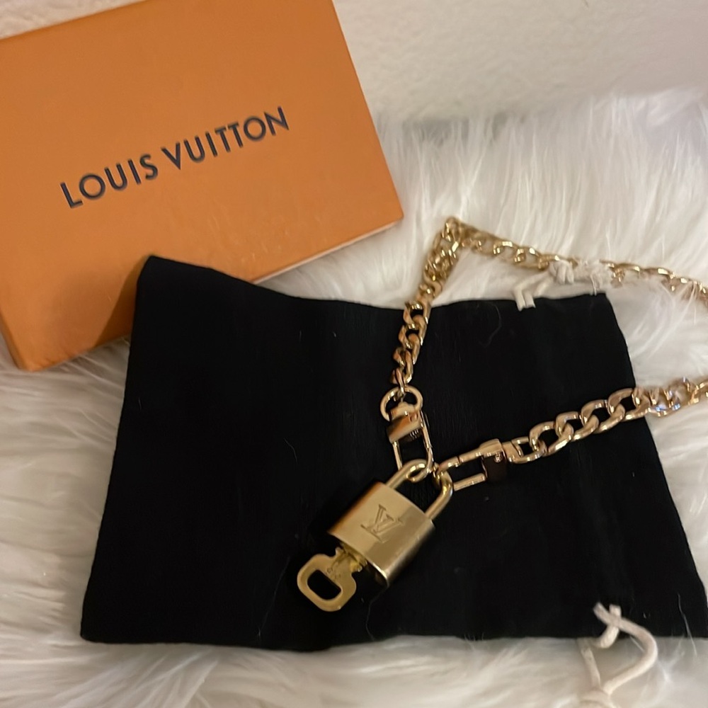 Louis Vuitton Gold Lock